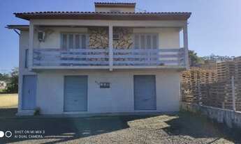 Imagem: Prédio Comercial com um apartamento na