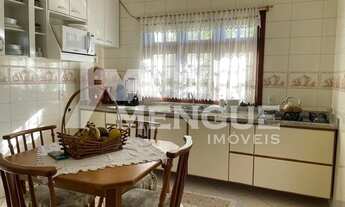 Imagem 5: Casa residencial com 3 dormitórios e 2 vagas em condomínio à venda no bairro Santa Fé em