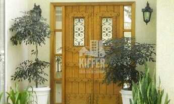 Imagem 3: Chácara Ubá Casa com 3 Suítes, Varanda, Jardim e Espaço de Lazer