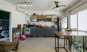 Imagem 7: Living em dois ambientes com cozinha americana, lavabo, pátio, lavanderia. o3 dormitórios