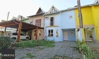 Imagem 2: Casa Condominio em Porto Alegre, no bairro Guarujá, com 3 dormitório(s), e 3 ban