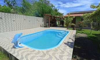 Imagem: Linda casa linear com loja e lindo jardim