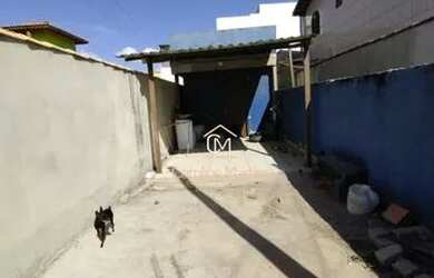 Imagem 4: Casa em rua calçada e na praia