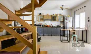 Imagem 3: Living em dois ambientes com cozinha americana, lavabo, pátio, lavanderia. o3 dormitórios