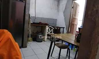 Imagem 5: Casa em rua calçada e na praia