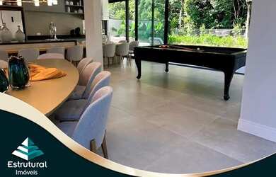 Imagem 6: Sobrado para venda possui 420 metros quadrados com 6 suítes em Riviera - Bertioga - SP