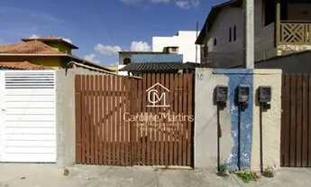 Imagem 2: Casa em rua calçada e na praia