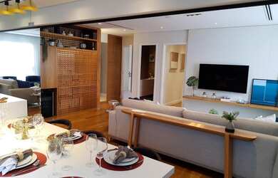 Imagem 5: Apartamento de 111 m² com 3 quartos, lavabo, 2 vagas e varanda com churrasqueira