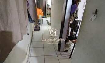 Imagem 3: Casa em rua calçada e na praia