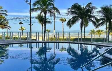 Imagem 2: Um dormitório com suíte e banheiro social vista mar