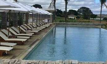 Imagem 6: Terrenos quitados em condomínio fechado por apenas 35 mil reais a vista ou no cartão.