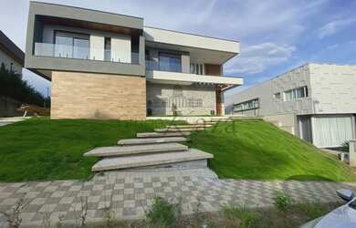 Imagem 2: Casa de condomínio para aluguel possui 450 metros quadrados com 4 quartos