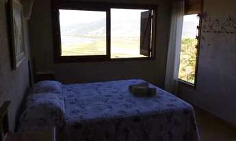 Imagem 5: Casa em condomínio fechado com piscina e vista para lagoa