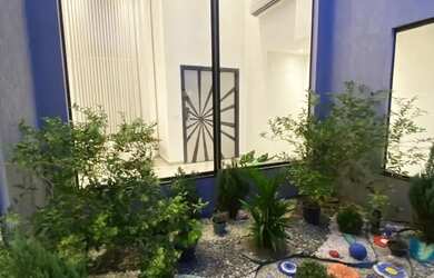 Imagem 3: Praia dos Passarinhos 03 Suítes sendo uma Master com Closet/ Piscina dividindo a cozinha e