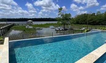 Imagem: Casa na beira do rio, em condomínio fechado