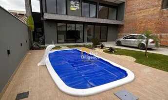 Imagem 3: Linda casa de 4 quartos a poucos metros da praia, com piscina e quintal!