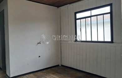 Imagem 7: Casa de madeira com 02 dormitórios, sala, cozinha e banheiro social