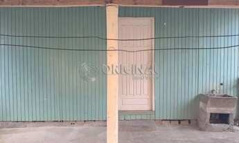 Imagem 5: Casa de madeira com 02 dormitórios, sala, cozinha e banheiro social