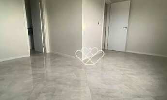 Imagem 2: Luxo e Conforto: Apartamento com Pé Direito Duplo, Lareira e Box no Edifício Valentina