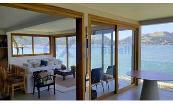 Imagem 2: Refúgio de Luxo à Venda: Casa em Condomínio com Acesso a Pista de Pouso no Portobello