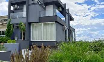 Imagem 2: CASA A VENDA NO CONDOMÍNIO ARUÃ DE ALTO PADRÃO COM 4 SUITES MAIS ESCRITÓRIO