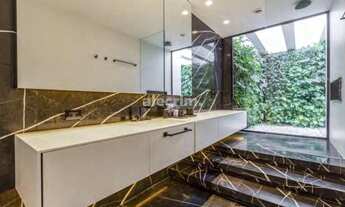 Imagem 11: Casa moderna assinada por guilherme torres no jardim paulista