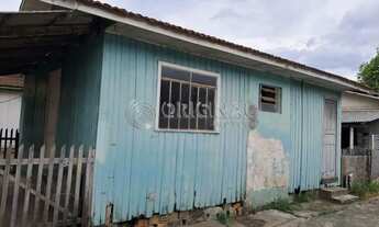 Imagem 2: Casa de madeira com 02 dormitórios, sala, cozinha e banheiro social