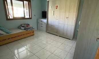 Imagem 7: Casa com piscina no centro de imbé