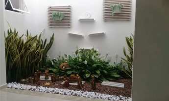 Imagem 5: Casa e um bairro residencial, sendo dois quartos, uma suíte com planejado