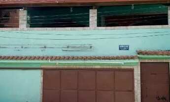 Imagem: Casa com terraço e cisterna