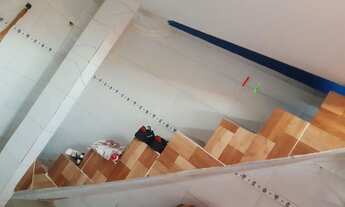 Imagem 4: Vendo uma casa com um prédio no fundo