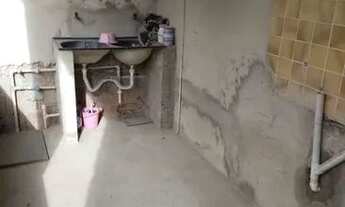 Imagem 7: Terreno de 360 m2 com 2 casas, garagem com 2 vagas e quintal grande