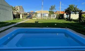 Imagem 6: Casa com piscina no centro de imbé