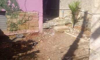 Imagem 2: Casa 1 dormitório sala cozinha WC área frente e trás