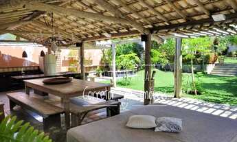 Imagem 2: Casa de condomínio para venda possui 600 metros quadrados com 4 quartos