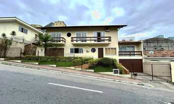 Imagem 3: Casa financiável com 3 dormitórios com Piscina em Barreiros, São José-SC