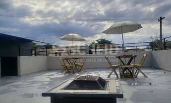 Imagem 4: Sobrado com três dormitórios e quatro vagas de garagem em Veleiros