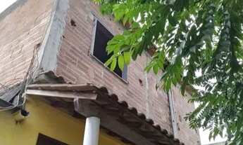 Imagem 6: Terreno de 360 m2 com 2 casas, garagem com 2 vagas e quintal grande