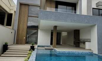 Imagem 2: Casa de condomínio para venda tem 355 metros quadrados com 4 quartos