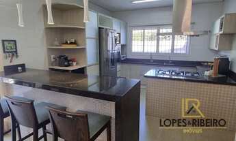 Imagem 5: Esse imóvel atende você que busca uma casa de alto padrão com cômodos bem distribuídos