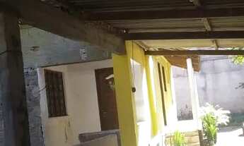 Imagem 2: Terreno de 360 m2 com 2 casas, garagem com 2 vagas e quintal grande