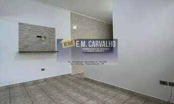 Imagem 4: Casa Geminada à venda, 2 dormitórios, 1 suíte, cozinha com armário, fogão e geladeira, qui