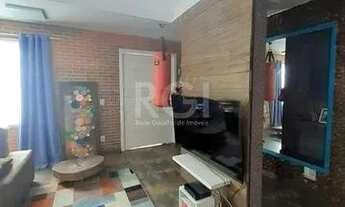 Imagem 4: Casa com 233m², 2 dormitórios sendo 1 suíte, living com lareira, espaço gourmet com churra