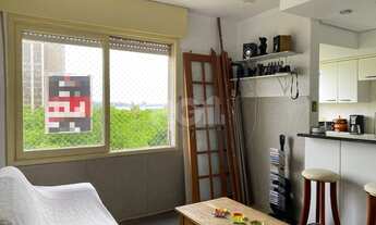 Imagem 3: Apartamento 1 dormitório, de frente, com vista para o Guaíba em todas as peças