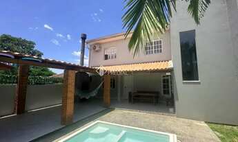 Imagem: Casa à venda 3 quartos (2 suítes), piscina