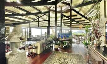 Imagem 3: Charmosa casa assinada por Zanina Caldas com encantadora vista panorâmica!