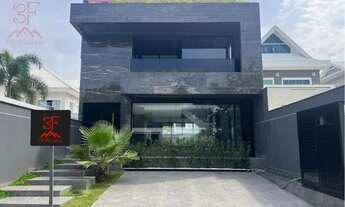 Imagem 2: Casa de luxo all black com piscina e vista para o parque da Pedra Branca