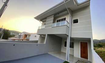 Imagem 3: Sobrado para venda possui 102 metros quadrados com 3 quartos em Potecas - São José - Santa