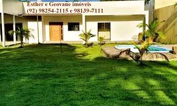 Imagem 2: Vende/Casa térrea/Condomínio Porto Tarumã/Ponta Negra/3 Suítes/Piscina/946m²/Manaus-AM