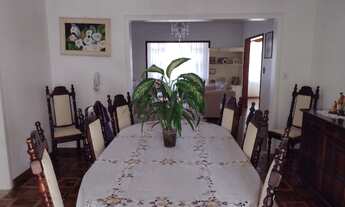 Imagem 2: Casa e terreno com lindo jardim